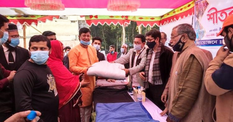 ফরিদপুরে নব জাগরণ সংঘের উদ্যোগে শীতবস্ত্র বিতরণ