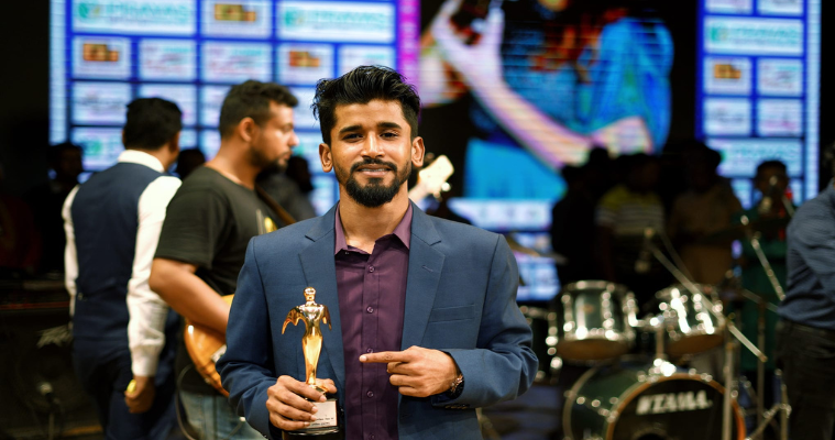 সেরা আলোকচিত্রী পুরস্কার পেলেন তিতুমীর কলেজের নয়ন